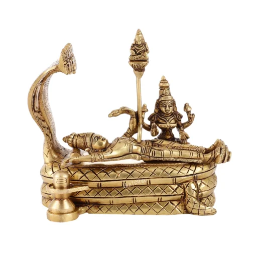 Brass statue of a deity reclining on a coiled serpent with an arched hood and a smaller deity figure holding a staff beside.