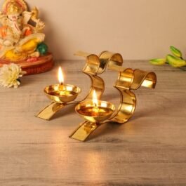 Modern OM Shaped Brass Diya Pair